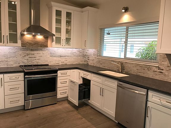 Beautiful kitchen, under counter lighting, pull-out trash
