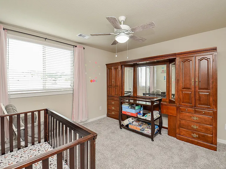 Second bedroom upstairs. Spacious.