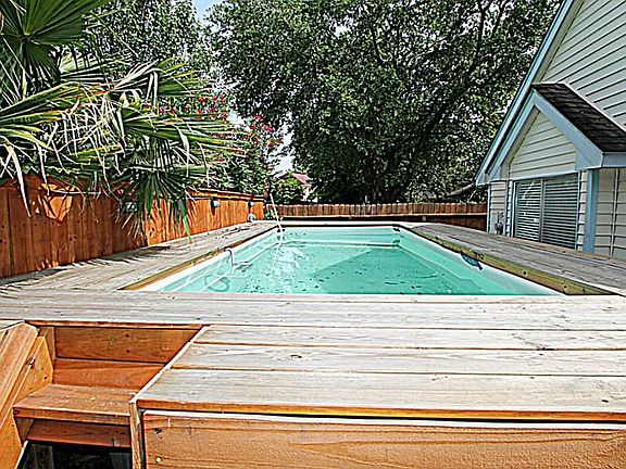 THIS POOL PROVIDES MUCH NEEDED RELAXATION TO END YOUR BUSY DAY