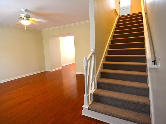 Entryway with Living Room and Stairs