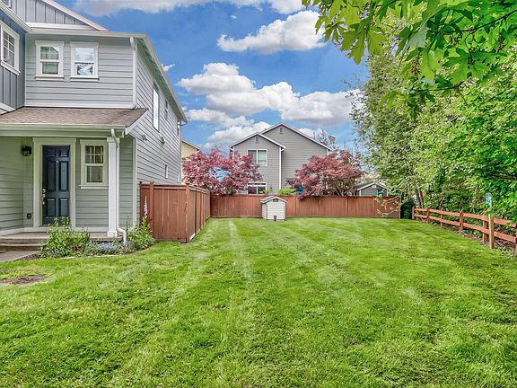 Next door to large grassy HOA maintained property