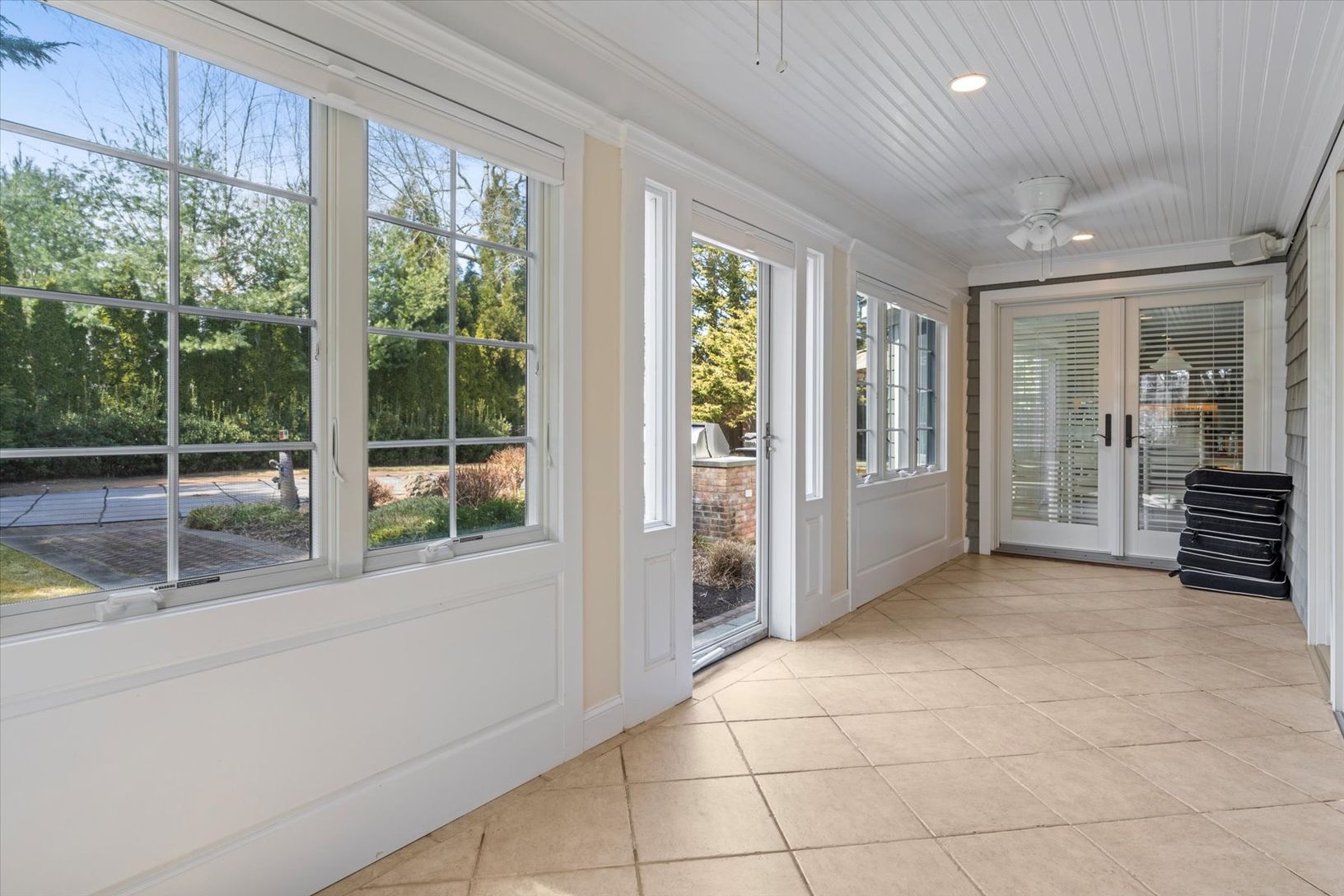 Sunroom that connects to backyard oasis and to both the breakfast nook and living room 