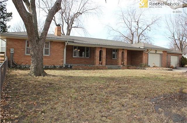 BRICK FRONT RANCH WITH 3 CAR GARAGE