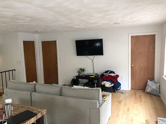 All brown doors have been freshly painted white.
