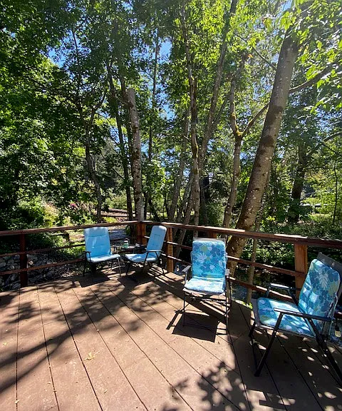 enjoy the babbling creek and the sunny afternoon on the deck!
