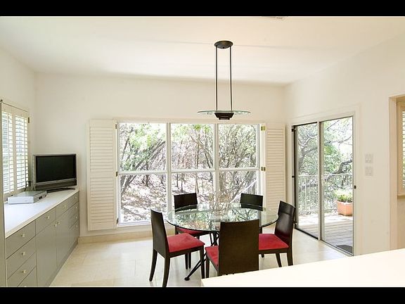 Breakfast room overlooks greenbelt & backyard