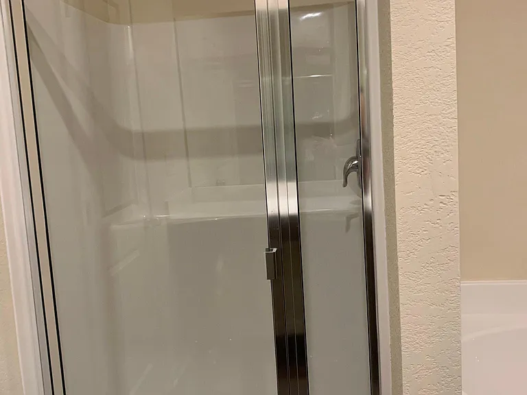 Master bathroom with a shower and a bathtub