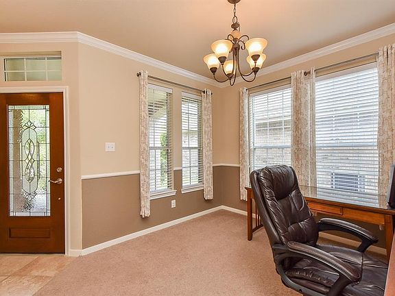 Formal Dining Room just off the entry. Currently being used as an office.