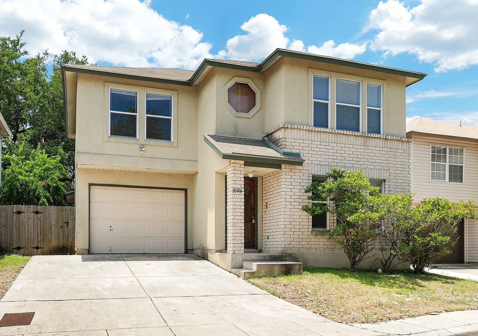 Two-Story Home with Modern Amenities and Prime Location — Photo 1