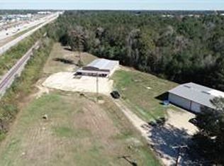 26597 E River Rd, Splendora, TX 77372