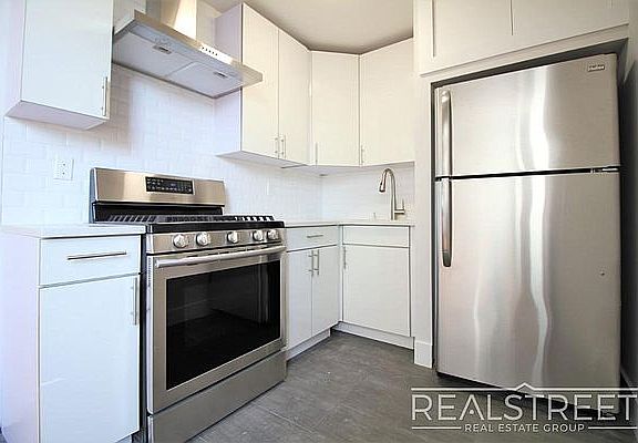 5th image of 90-02 Queens Blvd #409
