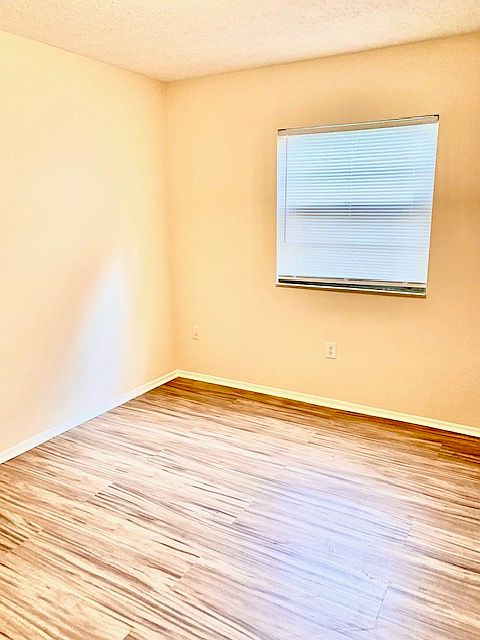 one of three bedrooms