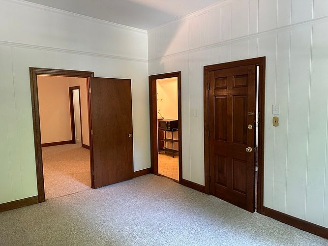 Living room with back to windows.
Door to foyer on right 2nd opening to hall storage and kitchen. Ahead is bedroom
