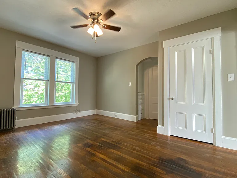 Master Bedroom with built in cabinets, closet and connection to full bathroom.