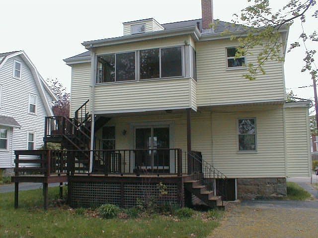 Rear w/ deck, shed & 4+ parking