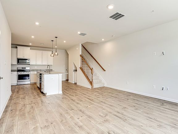 GORGEOUS TOP OF THE LINE KITCHEN With Open FloorPlan - Living Area.