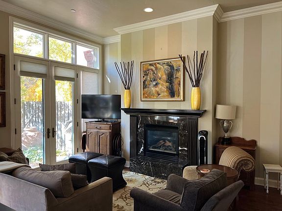 living area with gas fireplace