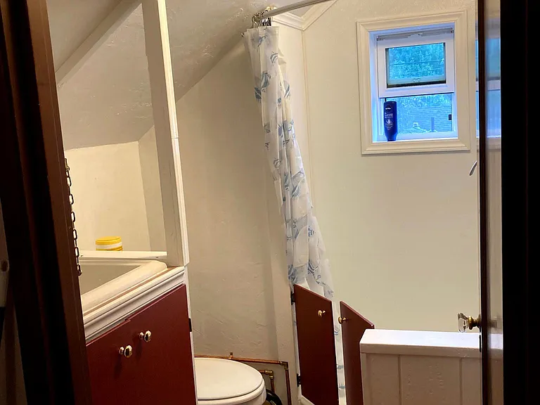 Upstairs 3/4 bathroom - sink and toiletry cabinet to the left.
