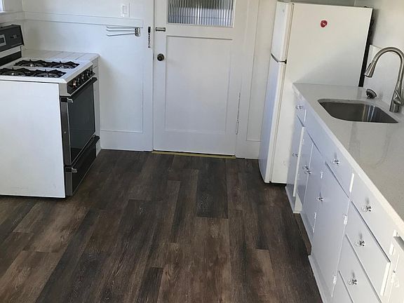 Remodeled kitchen with granite countertop
