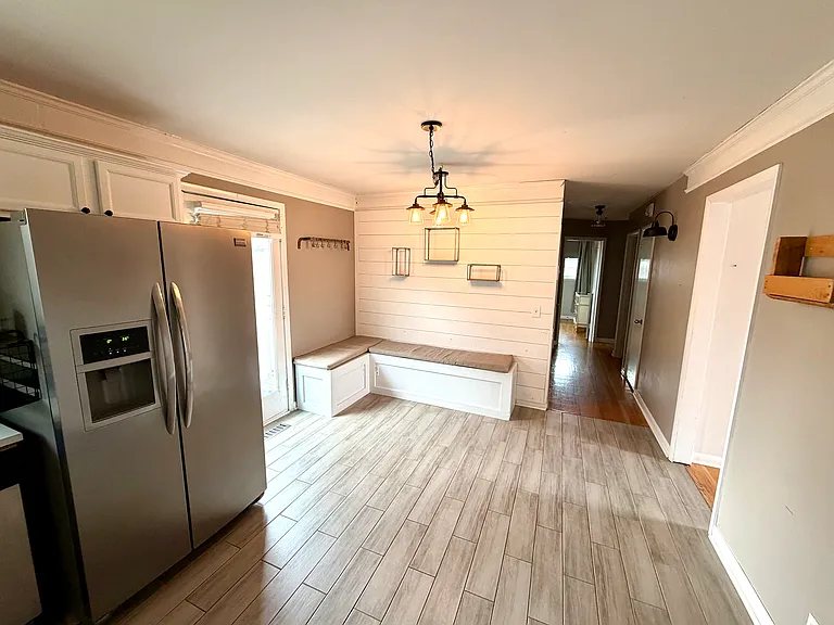 Kitchen with built-in storage bench