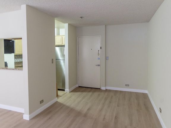 Front door and kitchen