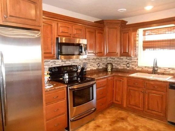 All stainless steel appliances and tile backsplash!