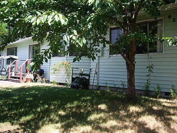 front yard - side of house facing water and mountains