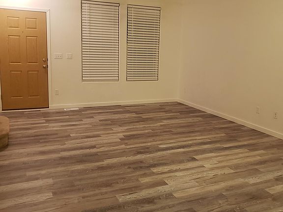 Living room carpet was replaced with flooring , blinds replaced a year ago.