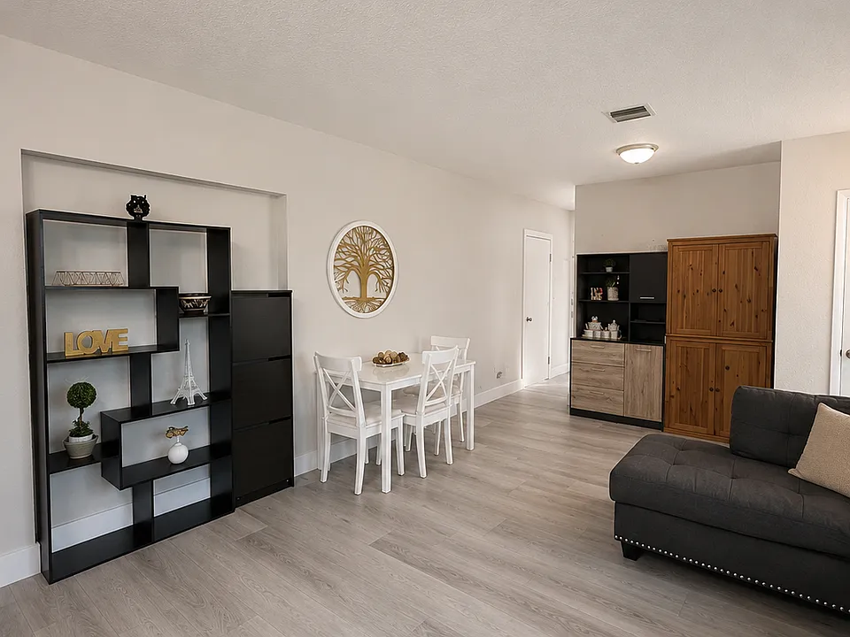 Living Room (view towards Kitchen, Laundry Room and Backyard)