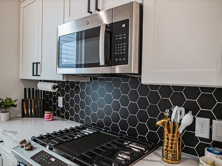Gas range and microwave.