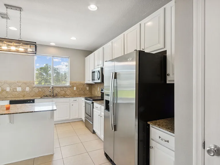 12677 Pine Marsh Way — Photo 42
