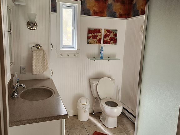 Bathroom with shower and heated floor