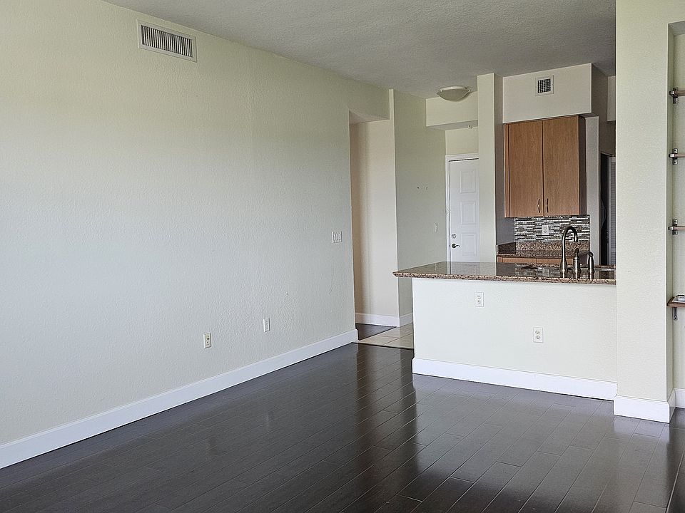 Living/dining room facing front door.