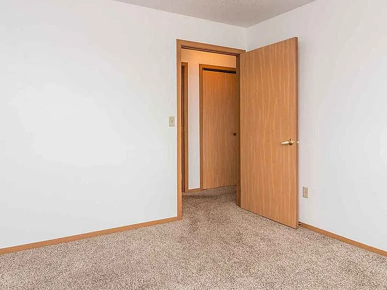 EAST WOODS APARTMENTS — Photo 8