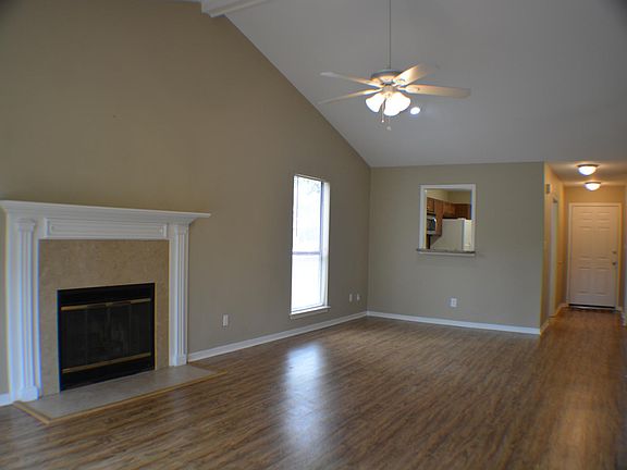 Living Room Dining Room Combo, Pass through window from Kitchen, Front Door.
