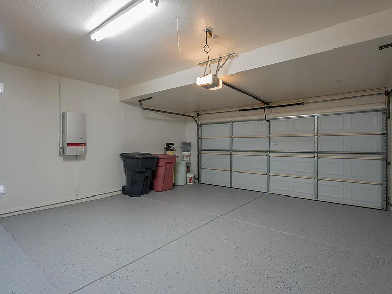 Spacious 2 Car Garage +Storage Cabinets