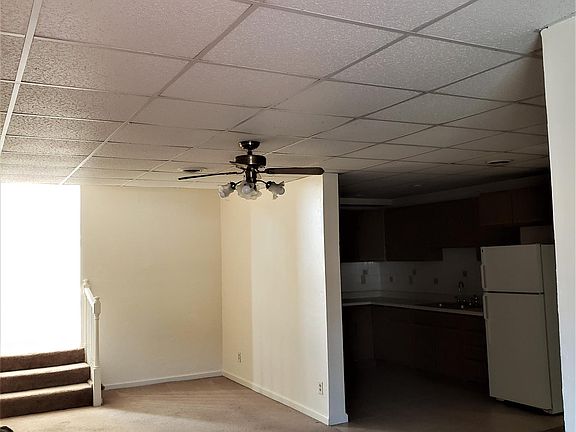 Living Room (showing stairs to bedroom)