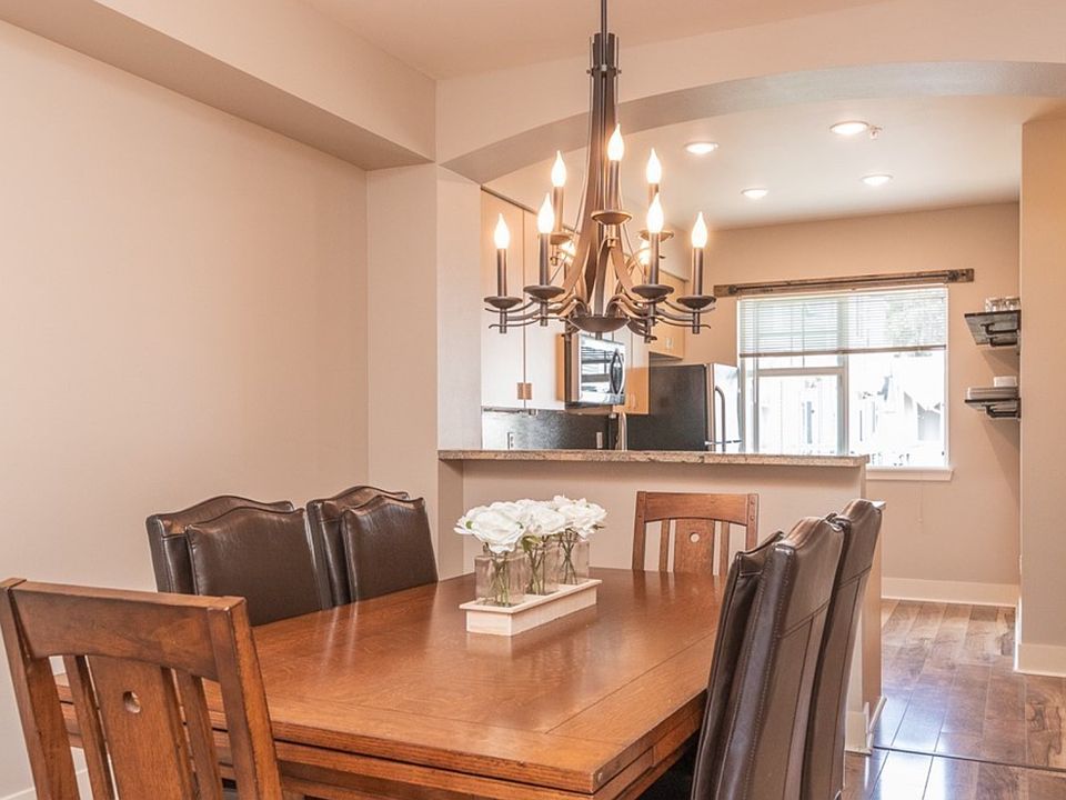 Dedicated dining space with a stylish chandelier (furniture not included)