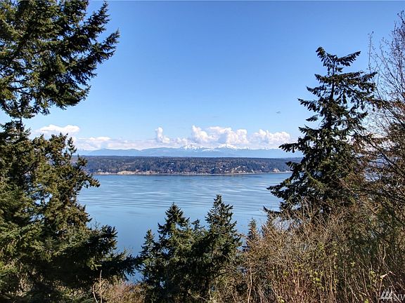 View of Port Susan Mt. Baker and the Cascades.  Feels like you can reach out and touch them.