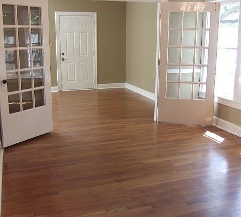 Original french doors separate living from dining