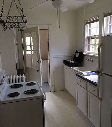 Kitchen with stove, refrigerator, pantry and access to washe