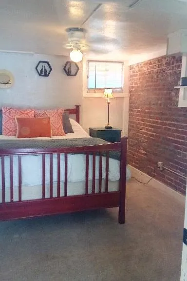 Exposed brick in master bedroom.