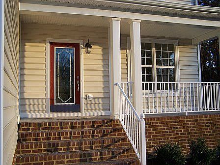 Raised front porch for sipping lemonade and watching the neighbors' kids play