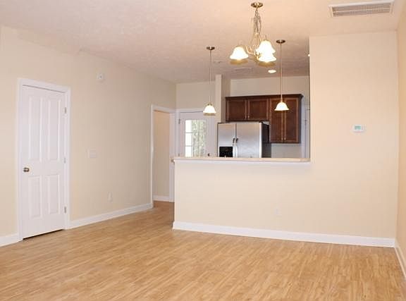 Dining/living area; laundry off kitchen; storage closet