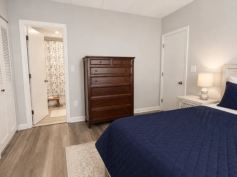 bedroom with bathroom view