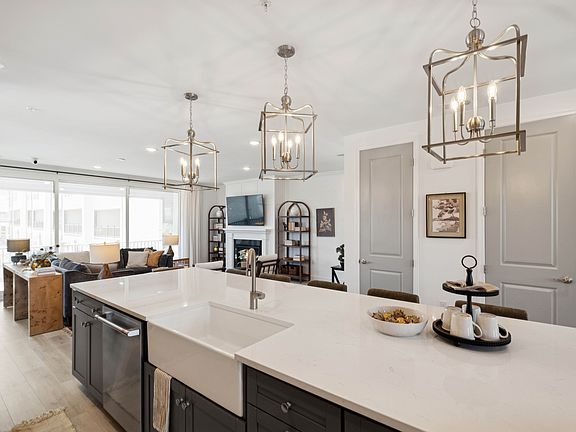 Island with white apron-front sink