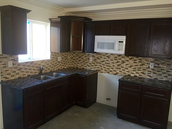 5th image of 9521 E Zamora Ave
