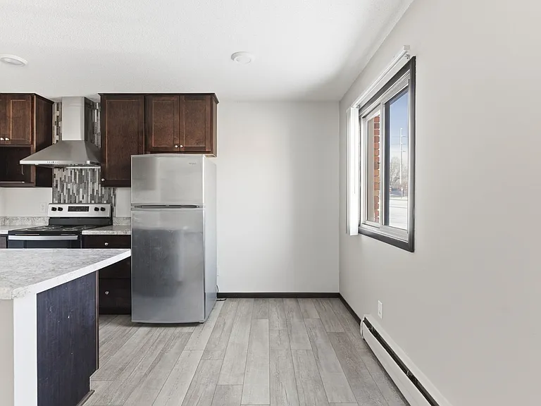 Welcome to St. Anthony Group, where modern design meets comfort. This spacious kitchen boasts sleek appliances and ample natural light, perfect for culinary adventures. Elevate your lifestyle todaycontact us for more information!