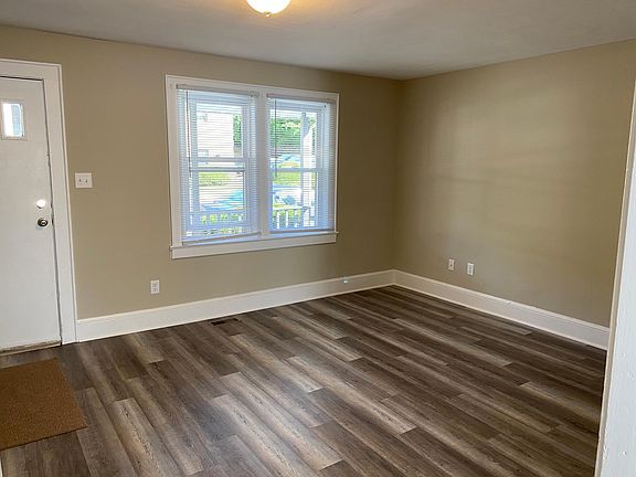 Living room dimensions 18' x 11 1/2'. Beautiful grey tones.