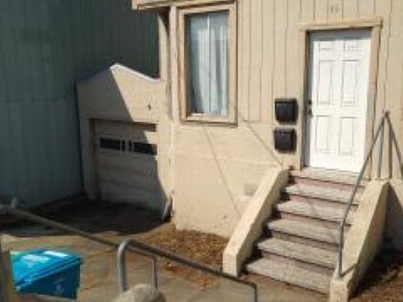 FRONT ENTRANCE & GARAGE